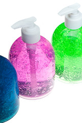 Image showing hair gel bottles over white