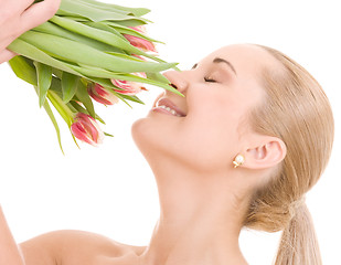 Image showing happy woman with flowers