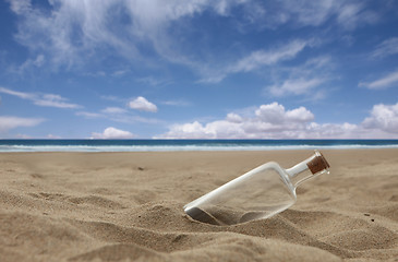 Image showing Beautiful Beach With Corked Bottle