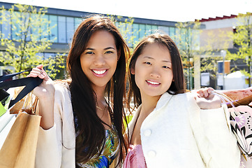 Image showing Young girlfriends shopping