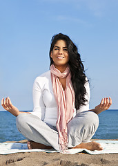 Image showing Young native american woman meditating