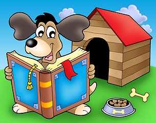 Image showing Dog with book in front of kennel