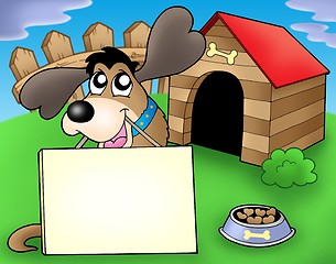 Image showing Dog with sign in front of kennel
