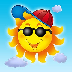 Image showing Cartoon Sun in cap on blue sky