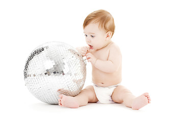 Image showing adorable baby boy with big disco ball