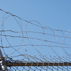 Image showing Barbed wire security fence