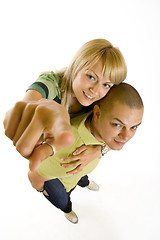 Image showing wide angle picture of a young couple pointing