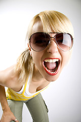 Image showing attractive casual woman screaming