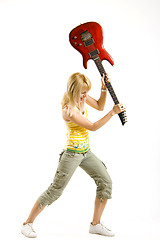 Image showing portrait of an attractive woman guitarist