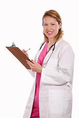 Image showing Female doctor holding chart