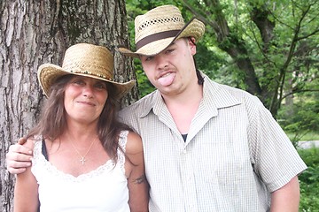 Image showing Couple outside standing in front of a tree