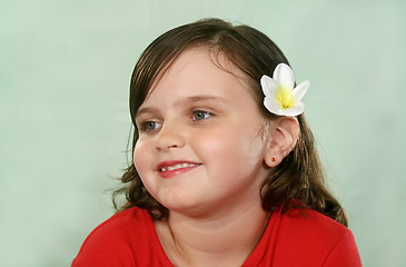 Image showing Child Smiling Looking Away