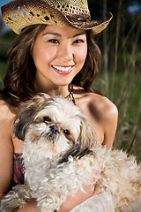 Image showing Beautiful summer girl with her dog