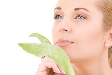 Image showing woman with green leaf