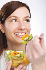 Image showing Eating fruit