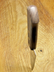 Image showing Knife in plank