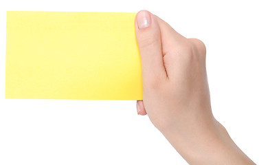 Image showing yellow card in a hand