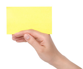 Image showing yellow card in a hand