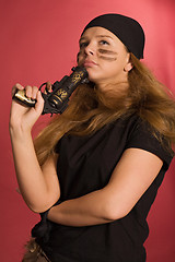 Image showing pensive girl in pirate costume