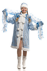 Image showing Happy girl in snow maiden costume with tinsel