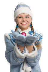 Image showing Smiling snow maiden showing christmas-tree decoration