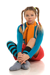 Image showing sad girl in colour clothes