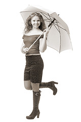 Image showing young girl with pink umbrella