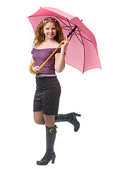 Image showing young girl with pink umbrella