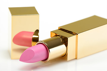 Image showing Pink golden lipstick on white background