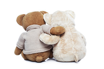 Image showing Back view of two Teddy bears hugging each other