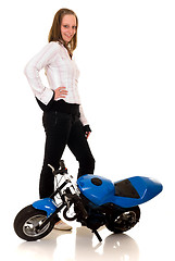 Image showing Youngster with her pocketbike