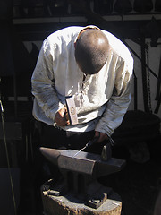 Image showing Blacksmith working