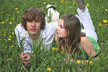 Image showing beautiful girl and boy on lawn