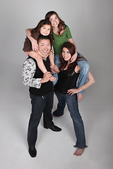 Image showing Fun and Unusual Vertical Family Portrait