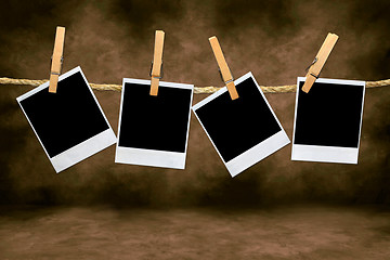 Image showing Empty Blank Film Frames Hanging From a Rope