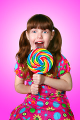 Image showing Portrait of a Funny Little Girl and Her Sucker