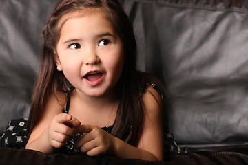 Image showing Young Female Child Talking and Looking Up