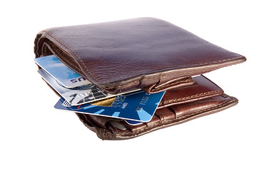 Image showing Old wallet with credit cards inside, isolated on white backgroun