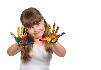 Image showing Smiling Day Care Preschool Child Painting With Her Hands