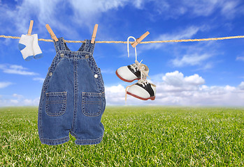 Image showing Baby Boy Child Clothes Hanging Outdoors