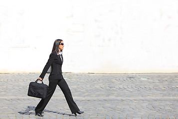 Image showing Businesswoman in a hurry