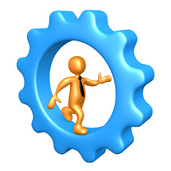 Image showing Businessman Running Inside A Cogwheel