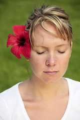 Image showing Woman in white with Green Background