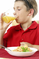 Image showing Child Drinking Juice