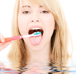 Image showing happy girl with toothbrush