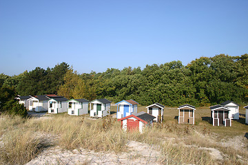 Image showing at beach  exists these small house