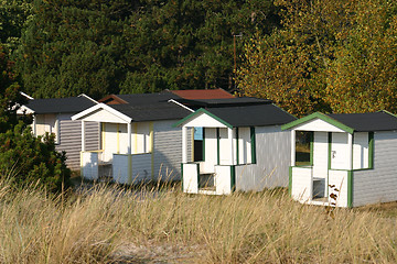 Image showing at beach  exists these small house