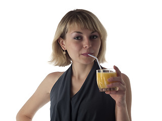 Image showing Blonde drinking juice