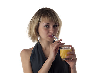 Image showing blonde drinking juice