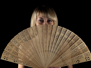 Image showing Beautiful blonde with fan